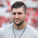 Illustration for article titled Scouts Highly Doubtful Tim Tebow Will Ever Make It To Heavenem/em